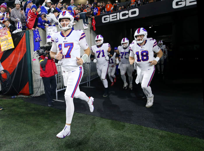 Jan 2, 2023; Cincinnati, Ohio, USA; Buffalo Bills quarterback Josh Allen (17) leads his teammates onto the field before the game against the Cincinnati Bengals at Paycor Stadium. Mandatory Credit: Joseph Maiorana-USA TODAY Sports